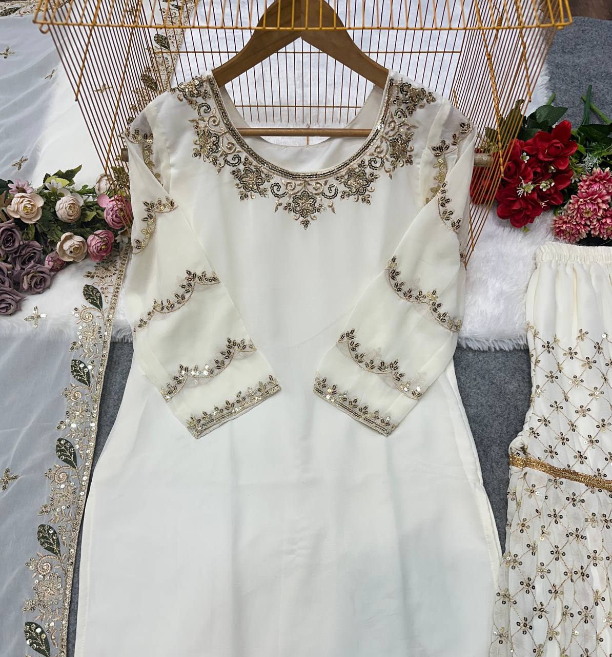 NEW ĐĚSIGNER PARTY WEAR TOP AND SHARARA