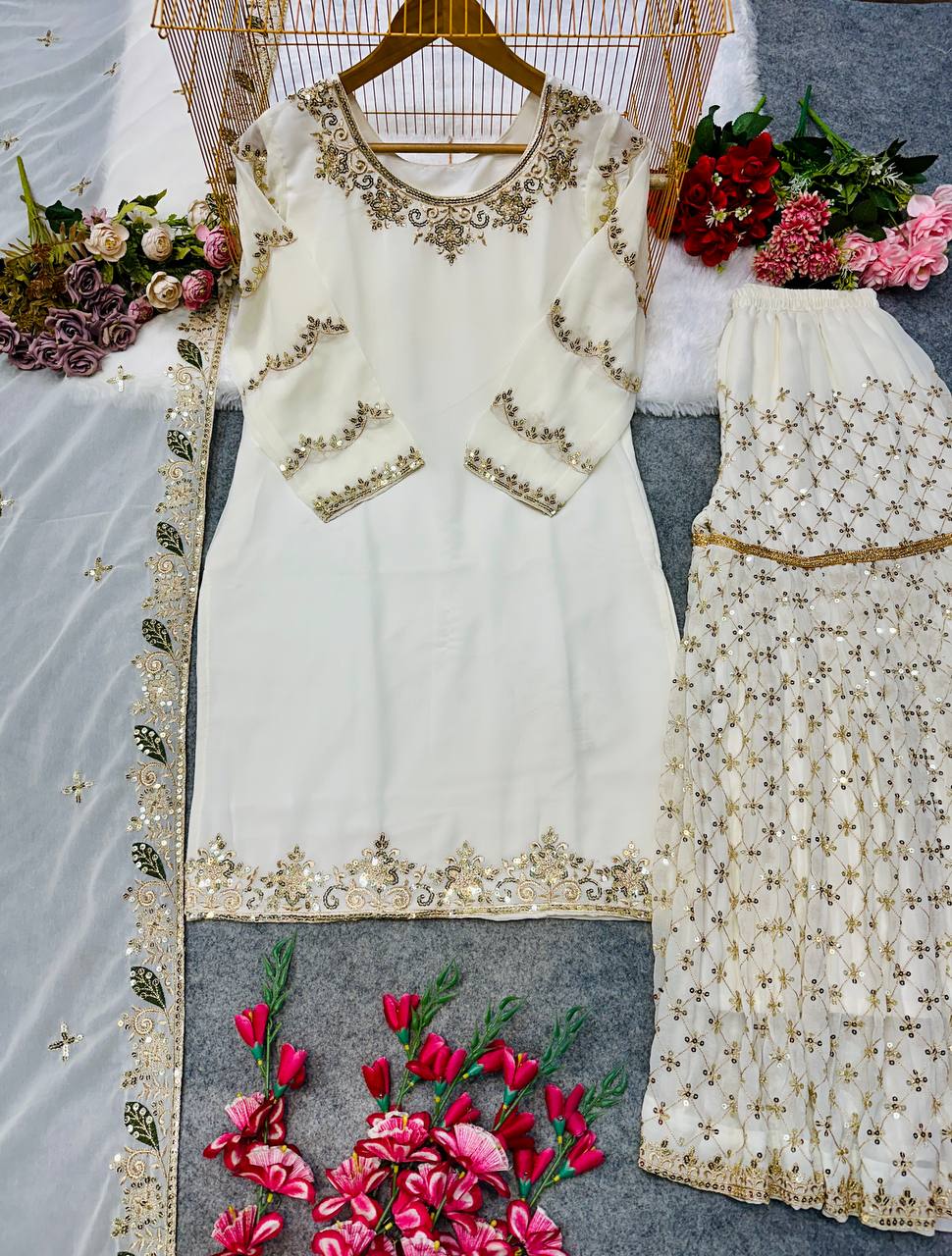 NEW ĐĚSIGNER PARTY WEAR TOP AND SHARARA